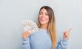 smiling woman with cash